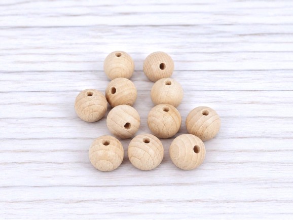 Wooden ball Ø20 mm.c/T.P.4.5mm.Ref.100-20T45