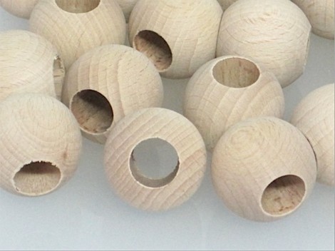 Bola de madera Ø30 mm.c/T.14 mm. / 100 uds.