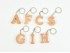 Beech wood keychain with initial 4 cm. Ref.PLF2C